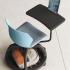 Chaise sur roulettes avec tablette écritoire monocoque polypropylène, gamme Milondo - France Bureau