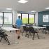 Chaise de formation pliante sur roulettes avec dossier résille noir et assise rembourrée - Gamme Vernier - France Bureau